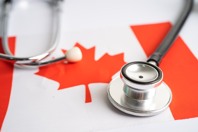 A Canadian Flag And Stethoscope